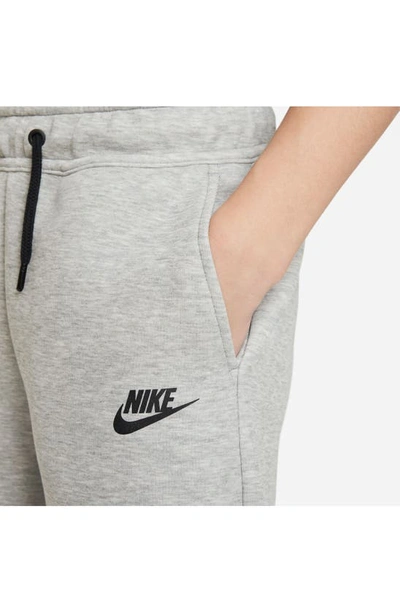 Shop Nike Sportswear Tech Fleece Shorts In Dark Grey Heather/ Black