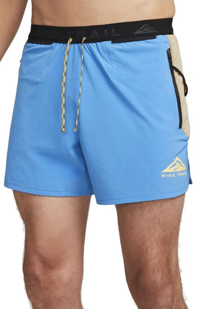 Shop Nike Second Sunrise 5-inch Brief Lined Trail Running Shorts In Photo Blue/ Khaki/ Sulfur