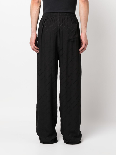 Shop Balenciaga Logo-jacquard Pyjama Trousers In Black