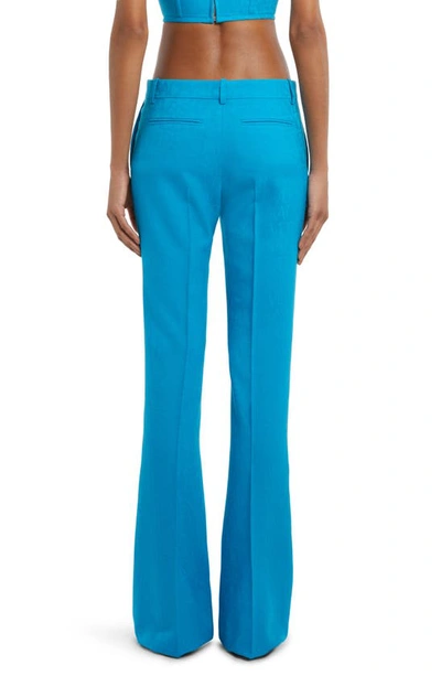 Shop Versace Tonal Logo Flare Leg Virgin Wool Pants In 1vb70 Mediterranean Blue