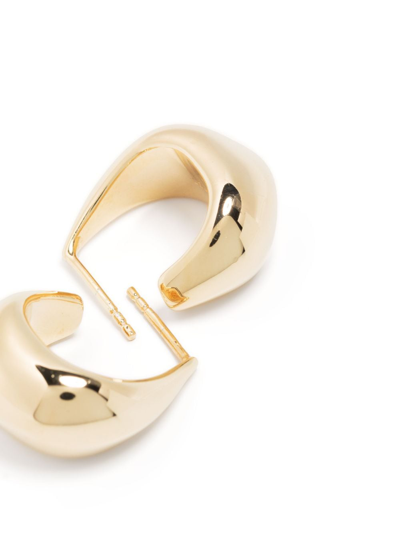 Shop Lemaire Sculpted Hoop Curved Earrings In Gold