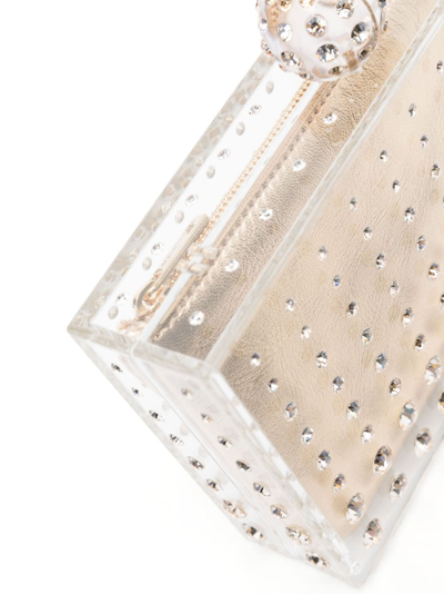 Shop Aquazzura Crystal-embellished Transparent Clutch In Gold