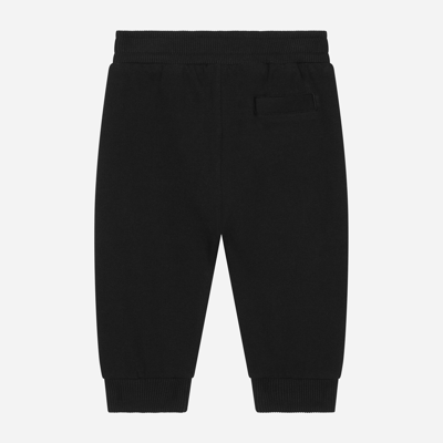 Shop Dolce & Gabbana Jersey Jogging Pants With Logo Print In Black
