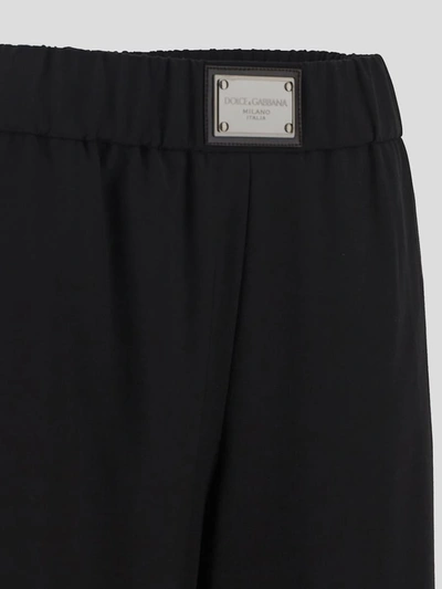 Shop Dolce & Gabbana Trousers In Black