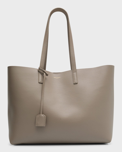 Shop Saint Laurent East West Calfskin Shopping Tote Bag In 2826 Greyish Brow
