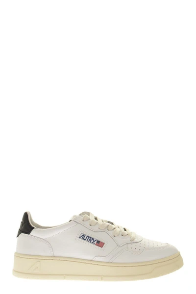 Shop Autry Medalist Low - Leather Sneakers In White/black