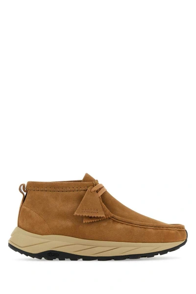 Shop Clarks Boots In Camel