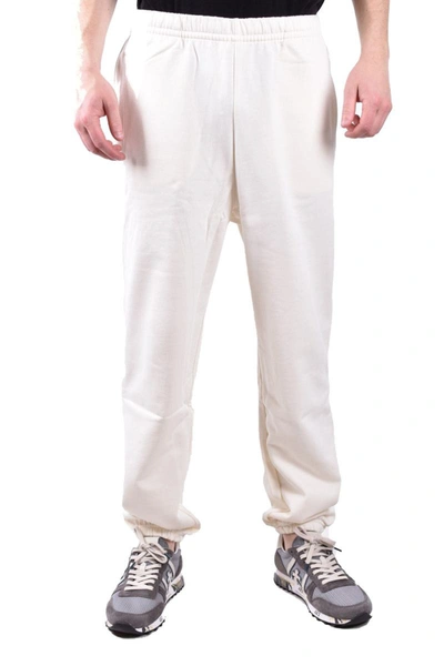 Shop Fred Perry Trousers In Cream