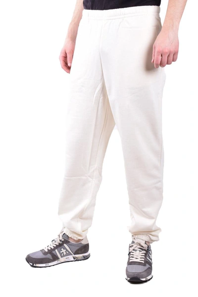 Shop Fred Perry Trousers In Cream