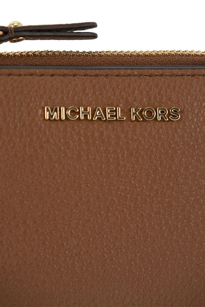 Shop Michael Kors Leather Wallet In Brown