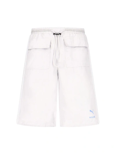 Shop Puma Trousers In White