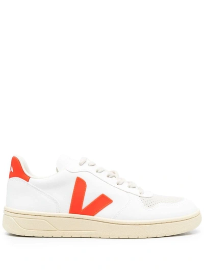 Shop Veja V-10 Shoes In White Orange Fluo