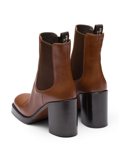 Shop Prada Brushed Leather 85mm Ankle Boots In Braun