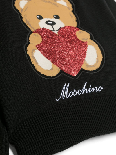 Shop Moschino Intarsia-knit Logo Jumper In Black