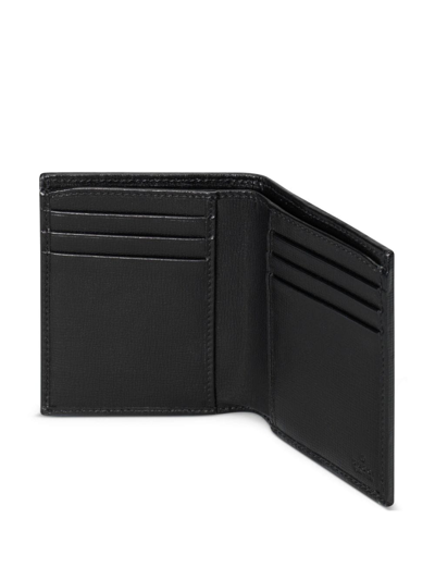 Shop Gucci Gg Supreme Bi-fold Wallet In Black