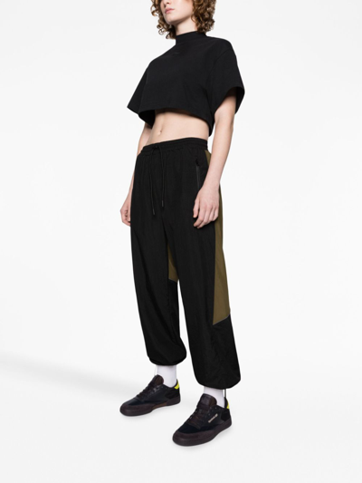 Shop Reebok Special Items Vector Blocked Panelled Drawstring Track Pants In Black