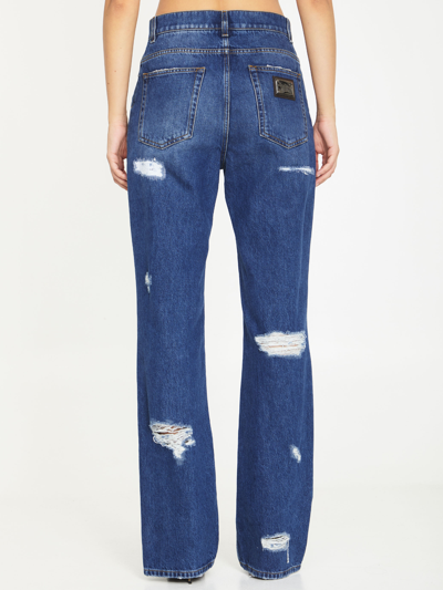 Shop Dolce & Gabbana Distressed Jeans With Leo Print In Light Blue