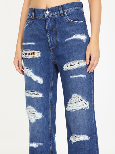 Shop Dolce & Gabbana Distressed Jeans With Leo Print In Light Blue