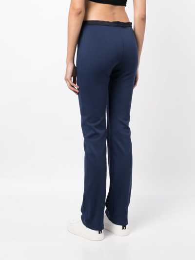 Shop Ralph Lauren Logo-waistband Low-rise Track Pants In Blue