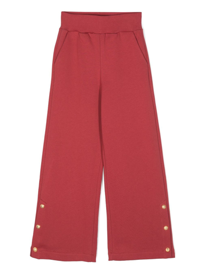 Shop Balmain Decorative-buttons Wide-leg Cotton Trousers In Red