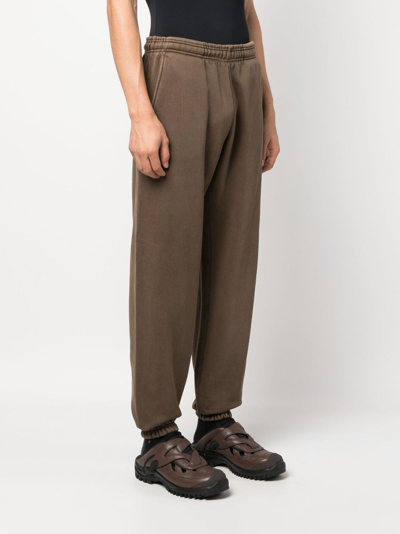 Shop Entire Studios Washed Organic-cotton Track Pants In Brown