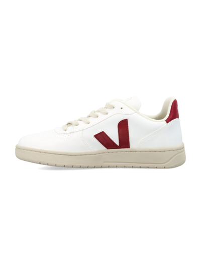 Shop Veja V-10 Sneakers In White/marsala