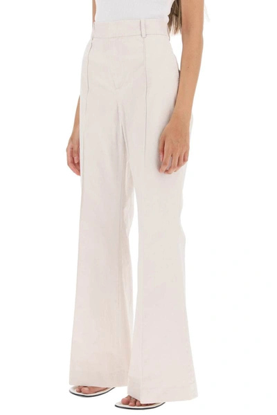 Shop Polo Ralph Lauren Cotton Bootcut Pants In White