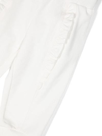Shop Monnalisa Ruffled Cotton Track Pants In White