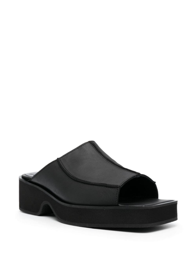 Shop Eckhaus Latta Frame 55mm Slip-on Leather Sandals In Black