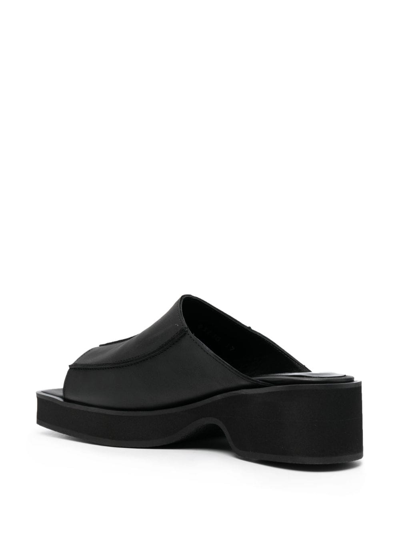 Shop Eckhaus Latta Frame 55mm Slip-on Leather Sandals In Black