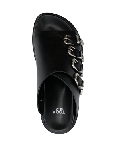 Shop Toga Western-buckle Leather Slides In Black