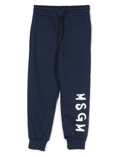 Shop Msgm Logo-print Cotton Track Pants In Blue