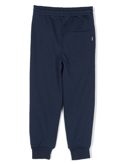 Shop Msgm Logo-print Cotton Track Pants In Blue