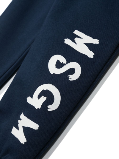 Shop Msgm Logo-print Cotton Track Pants In Blue