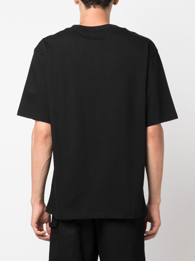 Shop Gcds Wirdo Win Logo-print Cotton T-shirt In Black