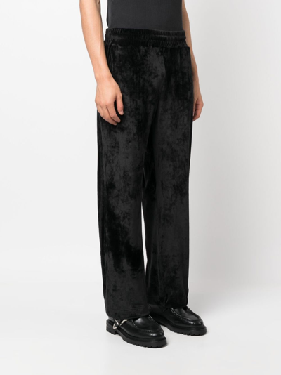 Shop Gcds Logo-embroidered Velvet Trousers In Black