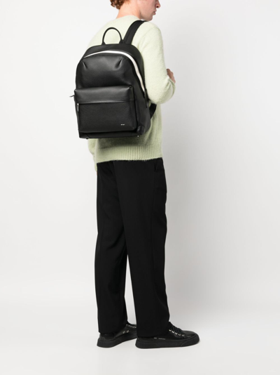 Shop Bally Debossed-logo Pebbled-leather Backpack In Black