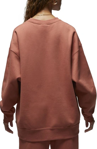 Shop Jordan Flight Fleece Oversize Crewneck Sweatshirt In Sky Orange