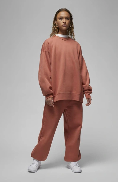 Shop Jordan Flight Fleece Oversize Crewneck Sweatshirt In Sky Orange