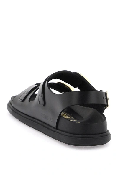 Shop Birkenstock 'cannes' Sandals In Black