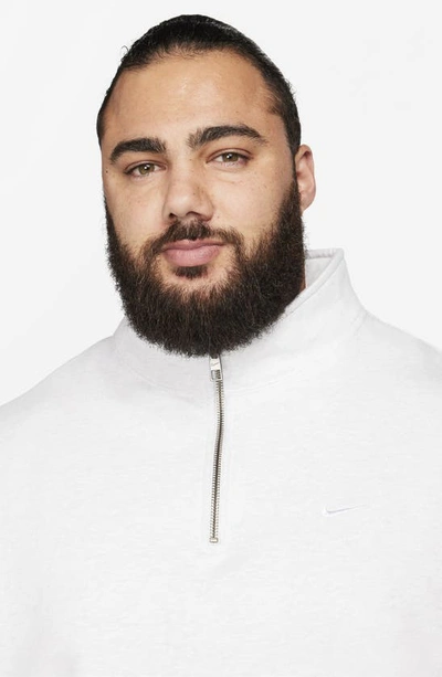 Shop Nike Solo Swoosh Oversize Quarter Zip Sweatshirt In Birch Heather/ White