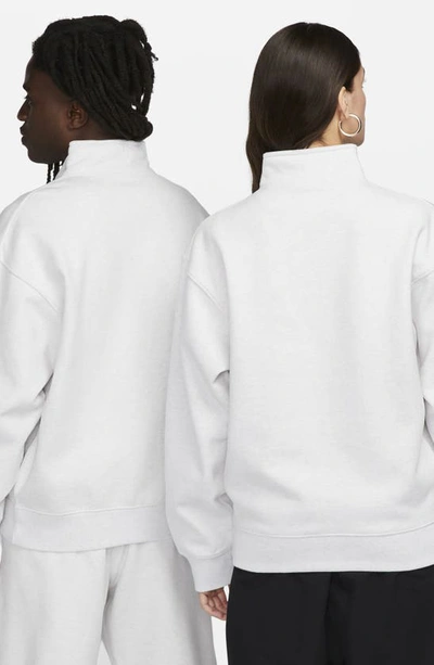 Shop Nike Solo Swoosh Oversize Quarter Zip Sweatshirt In Birch Heather/ White