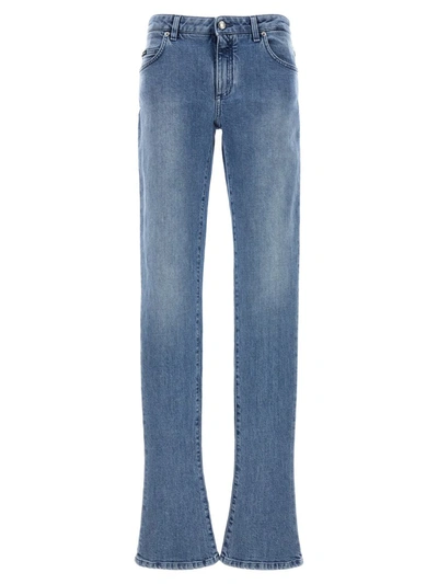 Shop Dolce & Gabbana Logo Plaque Jeans In Light Blue