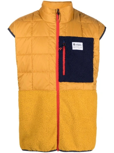 Shop Cotopaxi Trico Hybrid Vest Clothing In Ambam Amber &amp; Amber