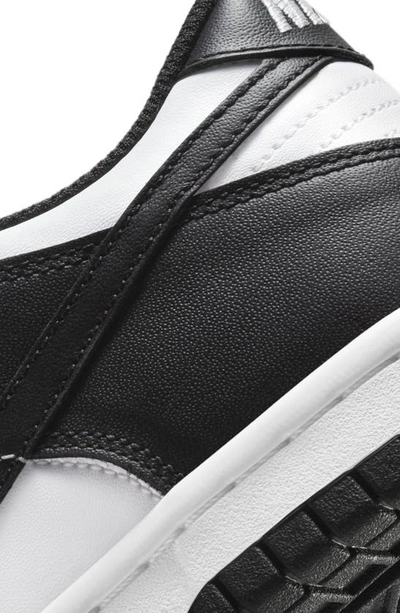 Shop Nike Kids' Dunk Low Basketball Sneaker In White/ Black