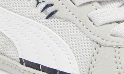 Shop Puma Graviton Ac Sneaker In Feather Gray-white-gray-blue
