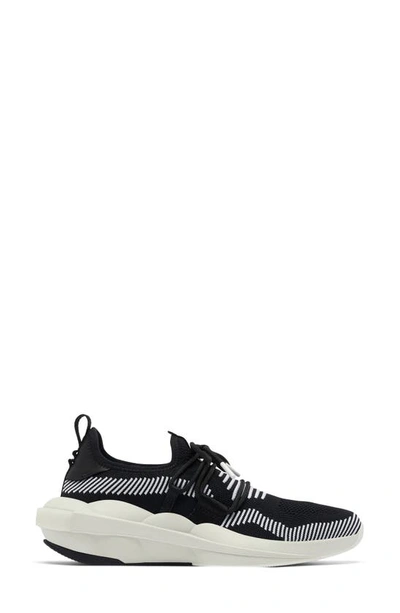 Shop Sorel Explorer Defy Low Sneaker In Black/ White