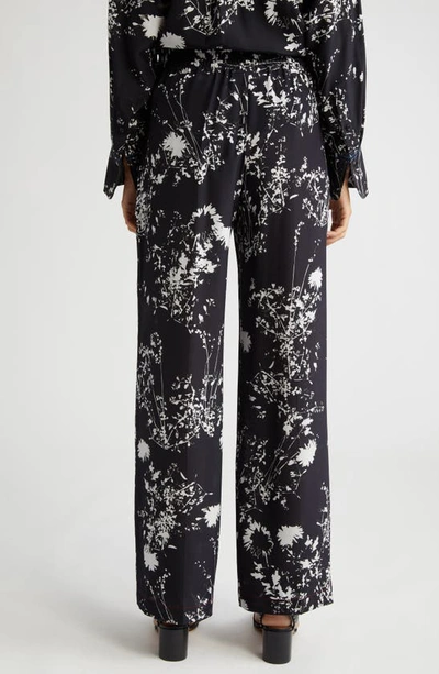 Shop Victoria Beckham Floral Print Silk Pajama Pants In Floral Negative - Black/ White