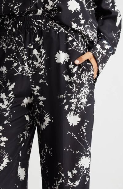 Shop Victoria Beckham Floral Print Silk Pajama Pants In Floral Negative - Black/ White