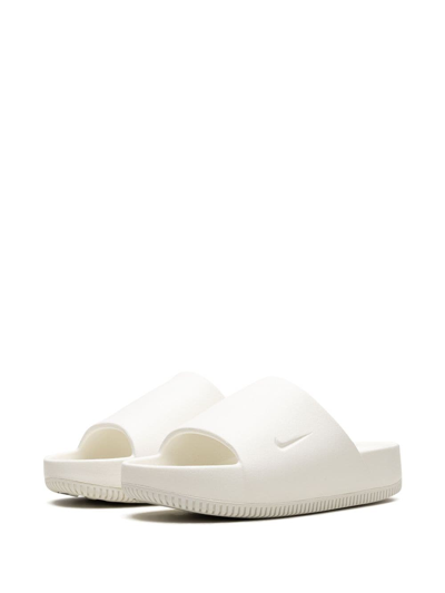 Shop Nike Calm "sail" Slides In White